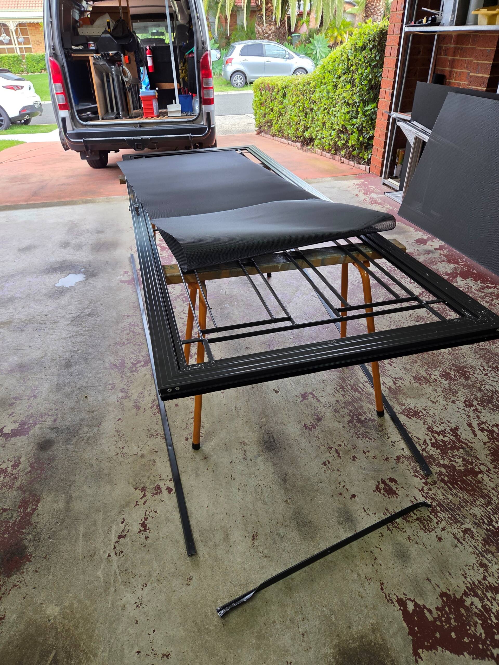 Mesh Replacement, Security Door Lock Repair Service, Powder Coating Solutions & Steel Door Restoration. 3 The Contractor Preparing For Work On Another Site