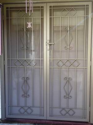 CB: 41 Clear Breeze Bright Steel Security Double Doors With Privacy Mesh In Jasper.