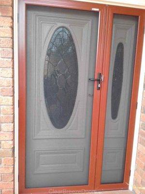 Cb: 32 Clear CB: 32 Clear Breeze Stainless Security Door With Hinged Side Panel In Manor Red. This is Similar To A Double Door Arrangement.Stainless Security Door With Hinged Side Panel In Manor Red. This Is Similar To A Double Door Arrangement.