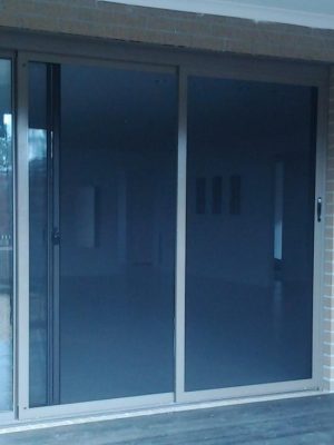 Cb: 52 Stacker Sliding Security Doors Fitted With Stainless Steel Mesh. Displaying The Two Security Doors In A Closed Position.