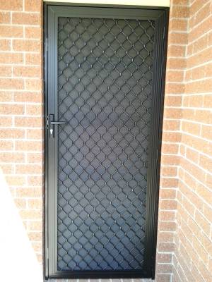 CB: 25 Black Standard Diamond Screen Door With Jamb Adapter Build Out Installed To The Existing Frame.
