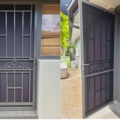 Door & Lock Repairs 2 Steel Security Door After The Restoration Powder Coated In Woodland Grey, Installed With High Strength Privacy Black Mesh