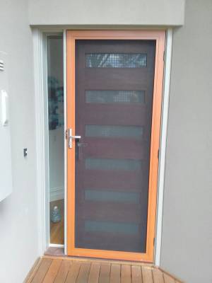 CB: 3 Western Red Cedar Wood Grain Finish With Satin Chrome Handle. Clear Breeze Stainless Range