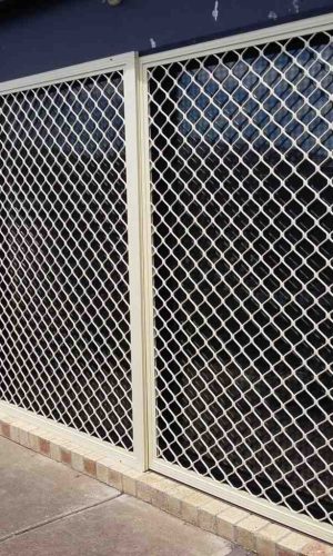 Cb: 50 Sliding Screen Door Standard Diamond Grille In Primrose With Black Aluminium Tuff Screen Installed On The Outside Track &Amp; Fixed Side Panel.
