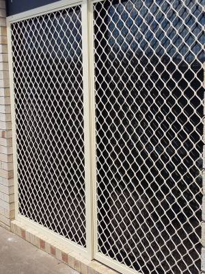 CB: 50 Sliding Screen Door Standard Diamond Grille in Primrose With Black Aluminium Tuff Screen Installed on The Outside Track & Fixed Side Panel.